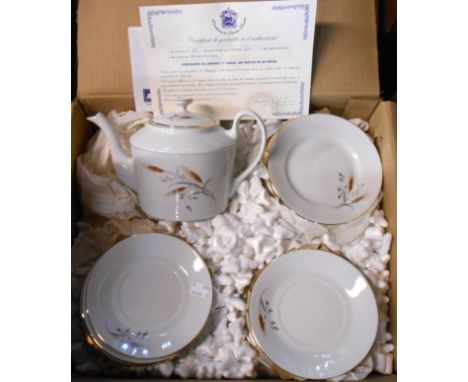 Four boxes containing an extensive Royal Limoges tea and dinner service - some in original shipping boxes and packaging with 
