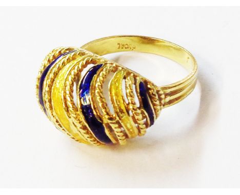 A yellow metal bombe ring with blue and yellow enamelled bands to dome top - some wear to enamel