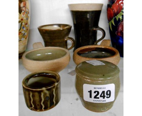 A selection of Leach studio pottery St. Ives standard ware and other items comprising jug, mugs, ramekins and mustard pot - s