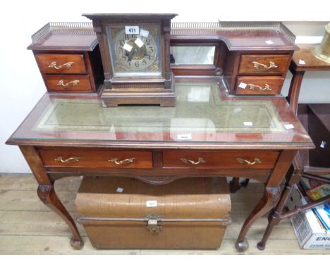 An 97cm mahogany bonheur de jour writing desk with galleried top and superstructure with flanking trinket drawers over a base