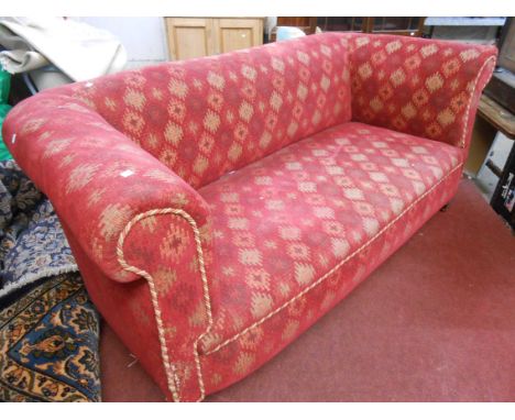 A 1.93m late Victorian two seater scroll end settee with original tapestry upholstery, set on turned legs and brown porcelain