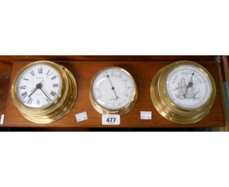 A brass bulkhead style weather station with Staiger quartz battery movement time piece, aneroid barometer and thermometer, se