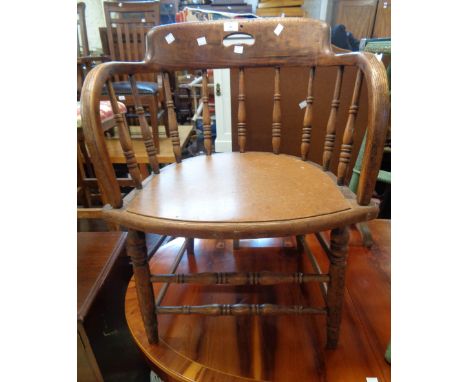 An office bow elbow chair with replacement seat panel - sold with an old spindle back chair with rush seat and an Edwardian b