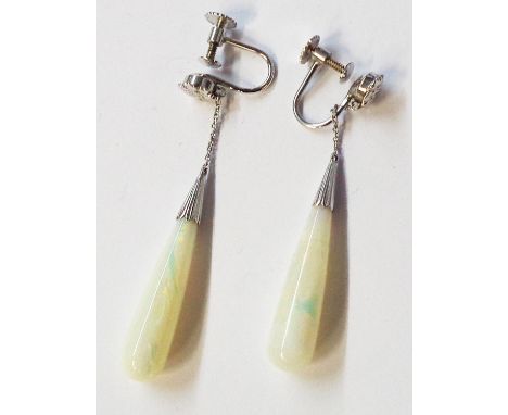 A pair of marked 585 (14ct) white metal screw back earrings, each set with a long slender opal drop