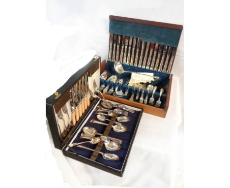 A vintage canteen containing an eight place setting of silver plated cutlery - sold with another