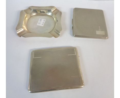 Two silver cigarette cases, both with engine turned decoration, one with blank cartouche - sold with a silver ashtray