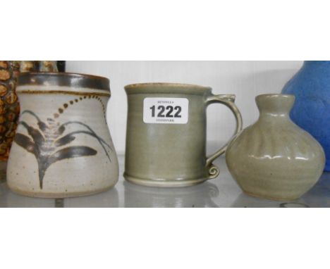 A David Leach Lowerdown Pottery mug with celadon glaze (chips to rim) and a small David Leach vase with cut decoration to the