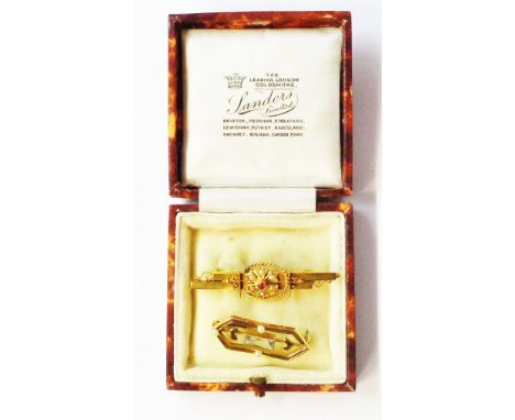 A 9ct. gold seed pearl and tiny tourmaline set bar brooch - sold with a marked 9ct similar with central aquamarine and flanki