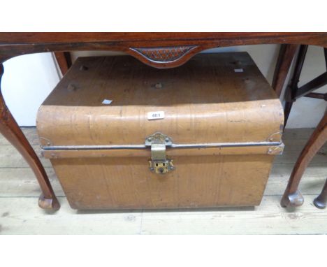 A 61cm vintage painted tin dome top travelling trunk with flanking drop handles