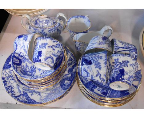 A Royal Crown Derby part tea set in the Mikado pattern with blue and white transfer printed decoration comprising seven trios