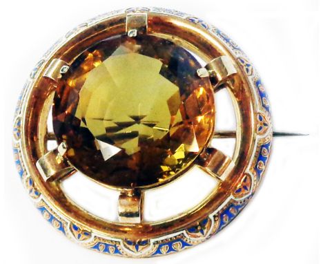 An antique unmarked yellow metal and champleve enamel framed Scottish brooch, with central open claw set 2.7cm diameter citri