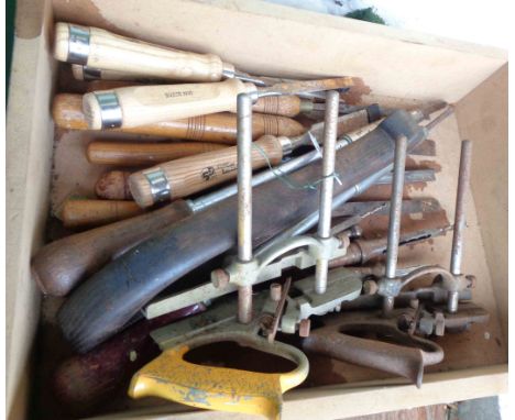 A drawer containing a quantity of assorted woodworking tools including two Record No. 044 planes, chisels, etc.