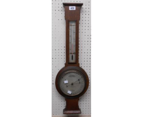 An early 20th Century oak cased barometer/thermometer with printed dial marked for Z. Baraclough &amp; Sons, Ltd., Leeds and 