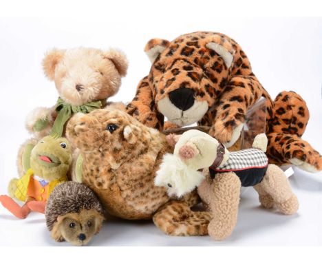 A quantity of manufactured teddy bears and soft toys, including a large Manhattan Toy Company  cheater in repose —28in. (71cm