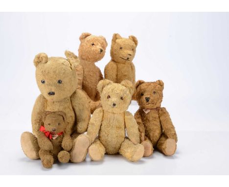 Six Eastern European art silk teddy bears,  the largest a light golden bear, with clear and black glass eyes, remains of pain