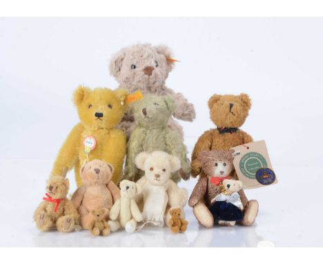 Two small Steiff yellow tag teddy bears,  a Petsy bear with golden mohair —7in. (18cm.) high; a Soft and Cuddly unjointed bea