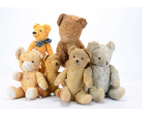 Six Eastern European art silk teddy bears, a blue bear with orange and black glass eye, black stitched nose, mouth and claws,