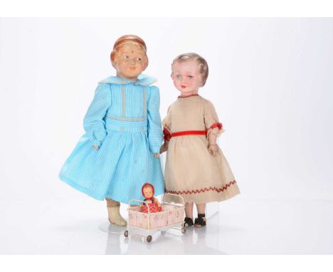 Three continental dolls,  an unmarked copy of Coquette doll by Gebruder Heubach, with painted features stuffed body, ceramic 