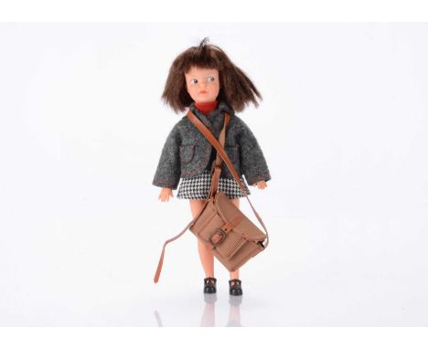 A 1967 -1970 Hong Kong Patch doll, in original outfit with satchel