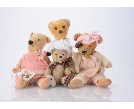 Four post-war teddy bears, A blonde1930s Chiltern type with clear and black glass eyes, black stitched nose and mouth, swivel