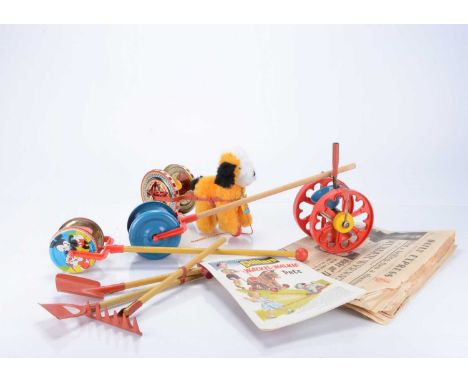 A selection of Chiltern post-war toys,  including a pull along soft toy dog, with bright golden, white and black syntenic plu