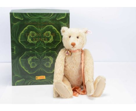 A Steiff limited edition Xenia teddy bear,  333 of 1500, made exclusively for Teddy Bears of Witney, with framed portrait of 