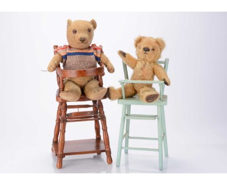 Two 1930s British teddy bears in high chairs,  a Chiltern with golden mohair, brown and black glass eyes, black stitched nose