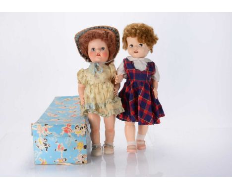 A Pedigree 1957-1959 Pretty Peepers  hard plastic walking doll, with auburn nylon wig, chest plate mechanism that changes col