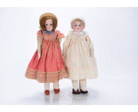 Two shoulder head dolls, a Cuno & Otto Dressel 1896, with blue sleeping eyes, blonde mohair wig, universal kid body with cera