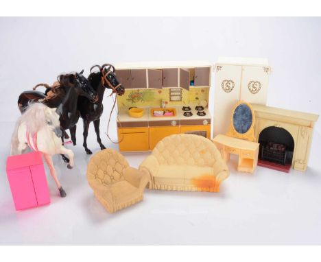 A 1980s Sindy's Doll House, modular cardboard with plastic supports and range of accessories including kitchen units, wardrob