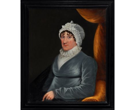 19th Century British School - A half-length portrait of a seated lady wearing a grey dress and white lace-trimmed cap, oil on