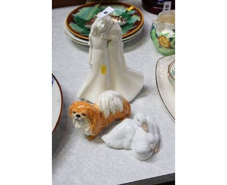 Royal Worcester figure group, Nao figure and a Sylvac dog