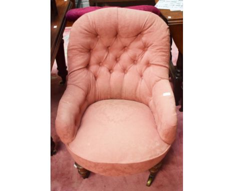 A VICTORIAN BUTTON BACK MAHOGANY OCCASIONAL CHAIR, on front turned cabriole legs, covered in rust fabric. (1) 