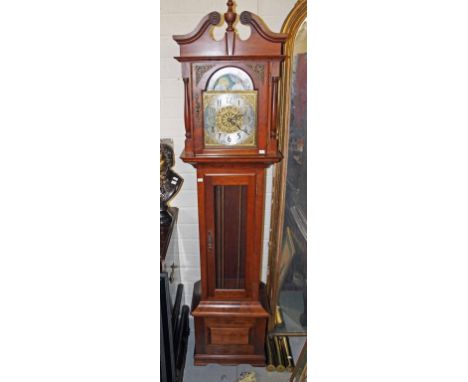 A MODERN GERMAN LONGCASE CLOCK,  the swan neck pediment with an urn finial, above an arched brass dial and silverised chapter