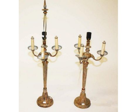 A PAIR OF CANDELABRA TYPE THREE-BRANCH SINGLE LIGHT TABLE LAMPS, each with tapering fluted column, 38in (97cm). (2) 