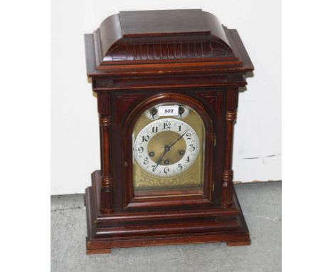 A GERMAN WALNUT CASED CHIMING BRACKET CLOCK,  20th century, by Ungmans of Germany, the two train movement striking on steel r
