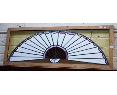 AN ATTRACTIVE LEADED AND COLOURED GLASS FAN LIGHT, in clear frame, 20" (51cm)h x 53" (135cm). (1) 