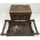 An Indonesian carved camphor wood miniat