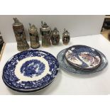 A collection of various serving plates/p