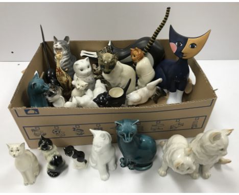 A collection of cat figures to include various Rosenthal examples, a Royal Copenhagen kitten, various Hutscheneruther figures