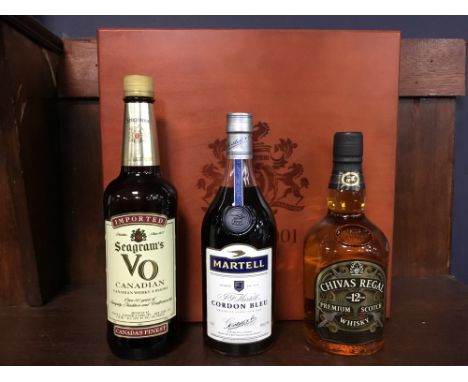 TWO SEAGRAM EMPLOYEE CELEBRATION BOXES Each set contains Chivas Regal aged 12 years (40%), Seagram's VO (40%), Martell Cordon