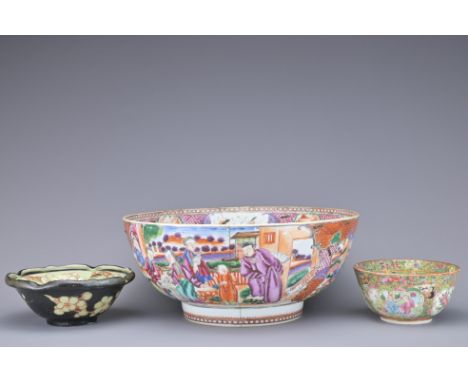 THREE CHINESE PORCELAIN BOWLS, 18/19TH CENTURY. To include a Qianlong famille rose export porcelain punch bowl decorated with