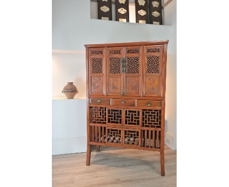 A CHINESE ELM WOOD KITCHEN CABINET, NINGBO, ZHEJIANG PROVINCE, 19/20TH CENTURY. The top section with large shelf storage behi