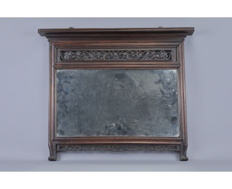 A CHINESE CARVED WALL MOUNT MIRROR IN HARDWOOD FRAME, 19/20TH CENTURY. With pierced panel and frieze. 53cm x 445cm.Slight los