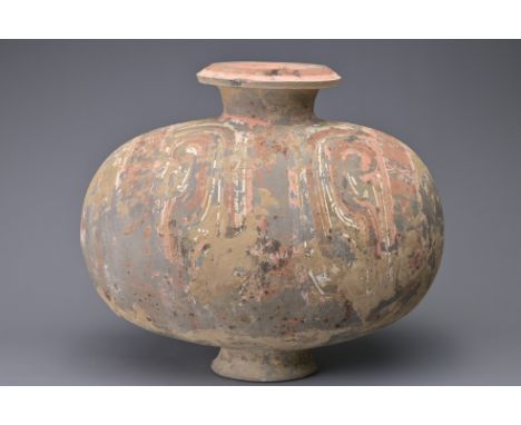 A FINE CHINESE WESTERN HAN DYNASTY PAINTED POTTERY COCOON JAR. Made from a relatively highly-fired grey pottery and decorated