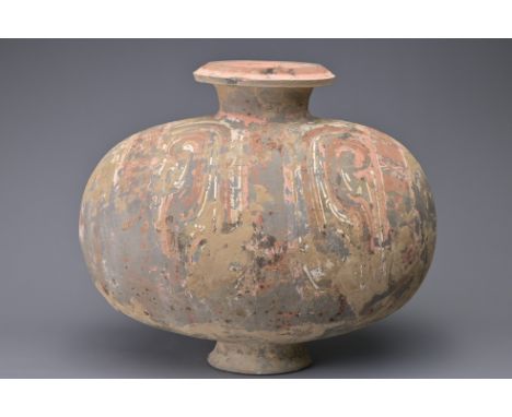 A FINE CHINESE WESTERN HAN DYNASTY PAINTED POTTERY COCOON JAR. Made from a relatively highly-fired grey pottery and decorated