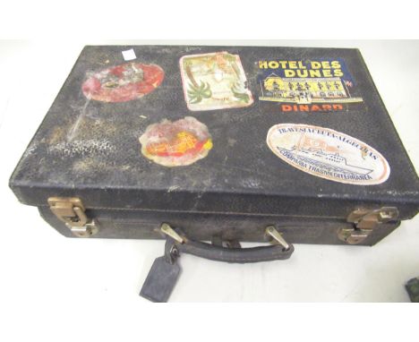 Small suitcase with various travel labels together with a quantity of postcards and share certificates 