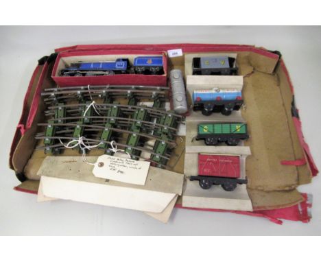 Chad Valley clockwork tin plate train set with locomotive, tender, various rolling stock and track (box at fault) 