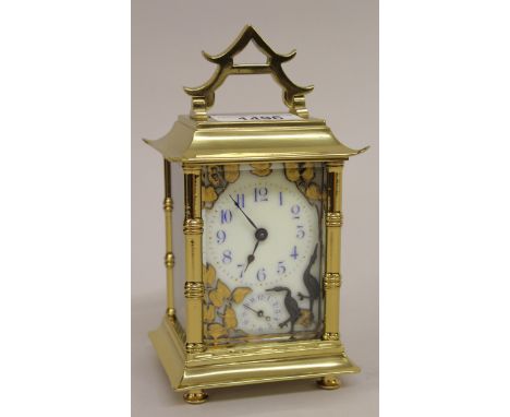 Unusual late 19th / early 20th Century brass cased carriage clock of Japanesque design by Duverdrey & Bloquel, the stylised c