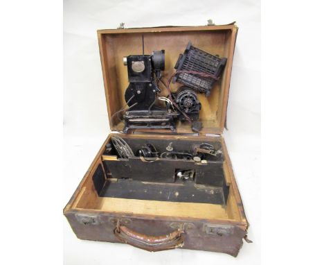 Early 20th Century Pathescope projector in original leather covered box (at fault) 